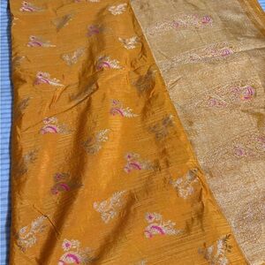 Elegant Gold and Orange Saree with Pink Accents